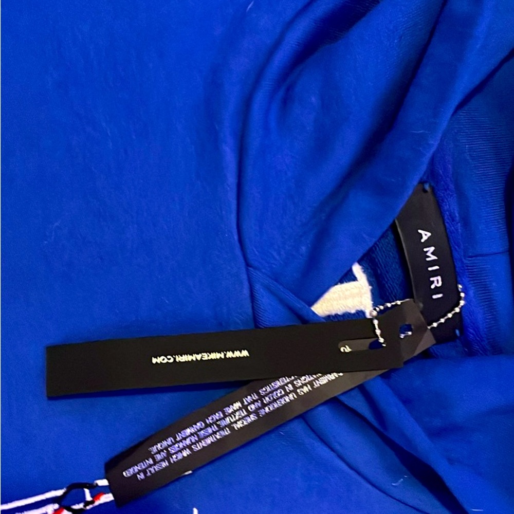 selling a Blue Amiri hoodie with tags size small used 2 times perfect condition